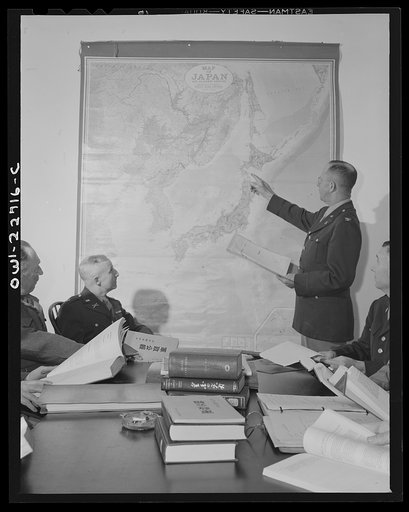 Charlottesville, Virginia. Committee assigned to the problem of Japanese political policy solving a tactical problem in the School of Military Government at the University of Virginia
