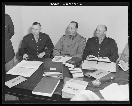 Untitled photo, possibly related to: Charlottesville, Virginia. Committee assigned to the problem of Japanese political policy solving a tactical problem in the School of Military Government at the University of Virginia