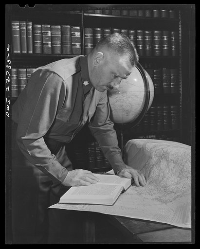 Charlottesville, Virginia. A colonel who is attending the School of Military Government doing research in the Library of International Law at the University of Virginia