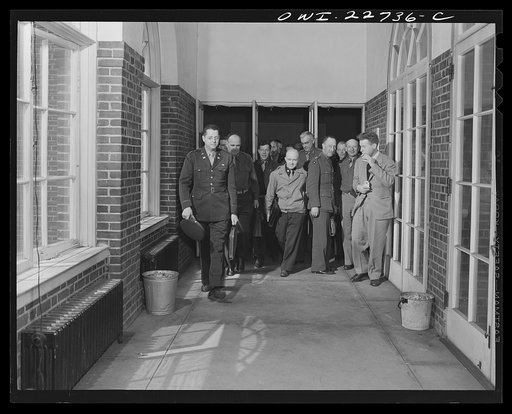 Charlottesville, Virginia. Officers leaving a lecture on foreign governmental policies in the School of Military Government at the University of Virginia