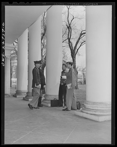 Untitled photo, possibly related to: Charlottesville, Virginia. Officers leaving classroom in the School of Military Government at the University of Virginia