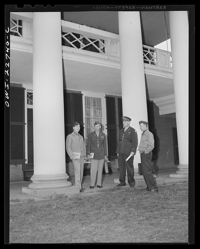Untitled photo, possibly related to: Charlottesville, Virginia. Officers leaving classroom in the School of Military Government at the University of Virginia