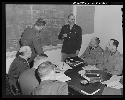 Untitled photo, possibly related to: Charlottesville, Virginia. Committee of ten assigned to the study of Japanese political administration studying tactical problems in the School of Military Government at the University of Virginia