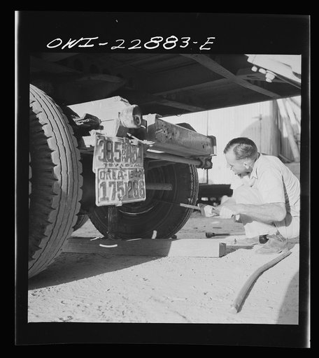 Lafayette, Louisiana. Changing a tire at the Herrin truck terminal