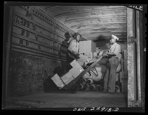 New Orleans, Louisiana. Loading trucks at the Associated Transport Company terminal
