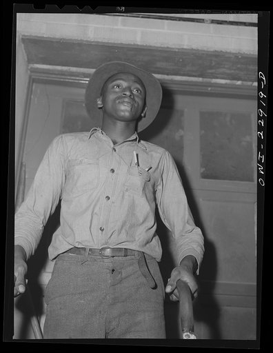 New Orleans, Louisiana. Loading platform worker