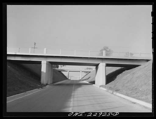 Burton, Texas. H&TC (Southern Pacific) railroad (Austin Branch Main and siding) bridge over Highway 290, looking towards Brenham, Texas