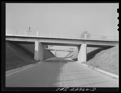Burton, Texas. H&TC (Southern Pacific) railroad (Austin Branch Main and siding) bridge over Highway 290, looking towards Brenham, Texas