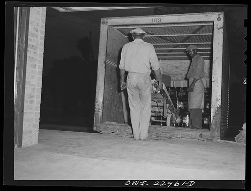 Untitled photo, possibly related to: New Orleans, Louisiana. Loading truck at the New Orleans terminal of the Associated Transport Company