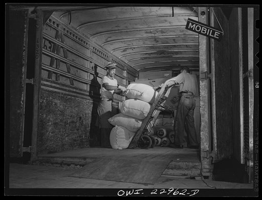 New Orleans, Louisiana. Loading a truck bound for Mobile at the Associated Transport Company