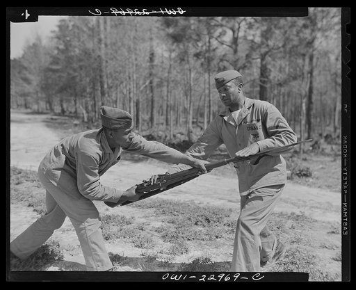 Negro Marines prepare for action. Breaking a tradition of 167 years, the U.S. Marine Corps started enlisting Negroes on June 1, 1942. The first class of 1,200 Negro volunteers began their training three months later as members of the 51st Composite Defense Battalion at Montford Point, a section of t
