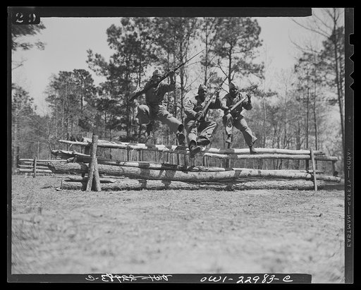Camp Lejeune, New River, North Carolina. Classes in bayonet training which are taught by Corporal Arvin L. Ghazlo. He also has charge of the "commando" and judo classes (at one time he taught judo to the state police of Georgia)