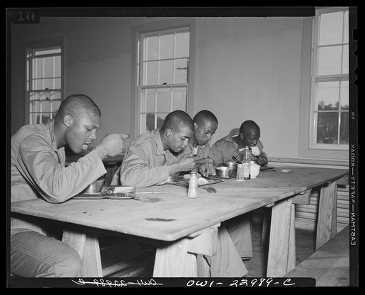 Camp Lejeune, New River, North Carolina. Members of the 51st Composite Battalion, U.S. Marine Corps, shown in the mess hall