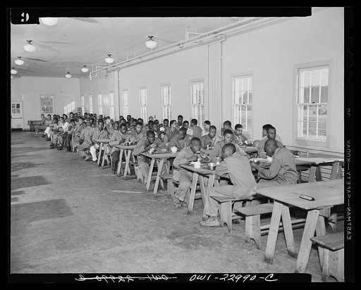 Camp Lejeune, New River, North Carolina. Negro enlistees of the 51st Composite Battalion, U.S. Marine Corps, at lunch in the mess hall