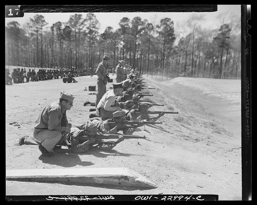 Camp Lejeune, New River, North Carolina. Engineers of the 51st Composite Battalion, U.S. Marine Corps, practice "on the firing line"