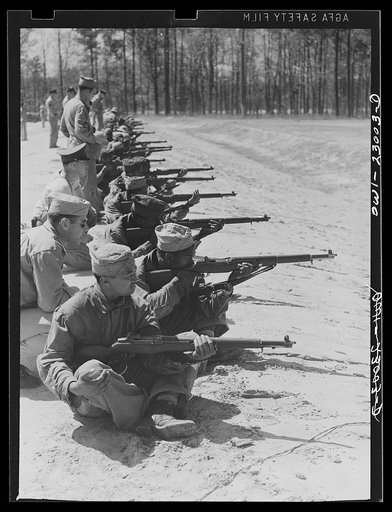 Camp Lejeune, New River, North Carolina. Engineers of the 51st Composite Battalion, U.S. Marine Corps, practice "on the firing line"