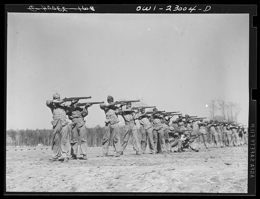 Camp Lejeune, New River, North Carolina. Engineers of the 51st Composite Battalion, U.S. Marine Corps, practice "on the firing line"