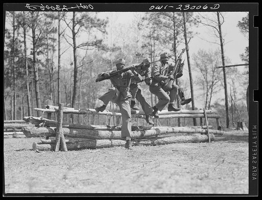 Camp Lejeune, New River, North Carolina. Classes in bayonet training which are taught by Corporal Arvin L. Ghazlo. He also has charge of the "commando" and judo classes (at one time he taught judo to the state police of Georgia)