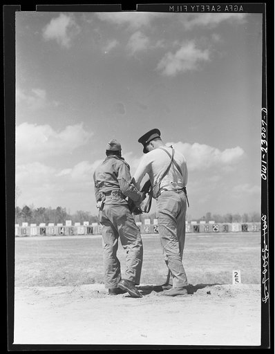 Camp Lejeune, New River, North Carolina. An engineer of the 51st Composite Battalion, U.S. Marine Corps, getting instruction in marksmanship