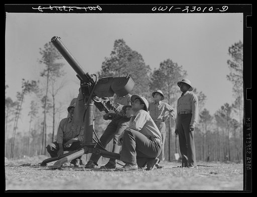 Camp Lejeune, New River, North Carolina. Negro Marines learning how to mow down the enemy with the thirty calibre machine gun