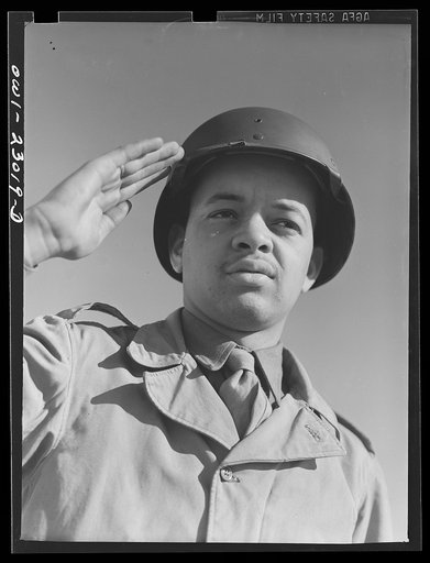 Camp Lejeune, New River, North Carolina. Negro Marine Corps enlistee saluting