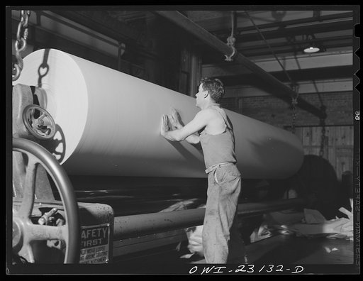 Lufkin, Texas. Southland paper mill. Newsprint rolling out at the end of a paper machine