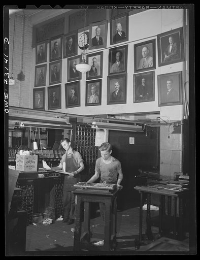 Dallas, Texas. Composing room at the Dallas Morning News. Pictures on the wall are of men who have worked in this room for twenty-five years