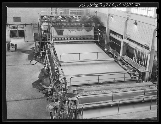 Lufkin, Texas. Southland paper mill. Stock flowing along the screen of a paper machine becomes paper as water is drawn off by suction