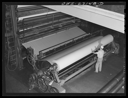 Lufkin, Texas. Southland paper mill. Newsprint rolling up at the dry end of a paper machine