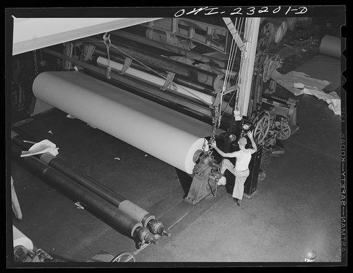 Lufkin, Texas. Southland paper mill. Finished roll of paper on the winding machine before being cut to size