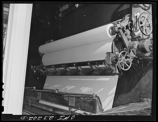 Untitled photo, possibly related to: Lufkin, Texas. Southland paper mill. Newsprint rolling up at the dry end of a paper machine