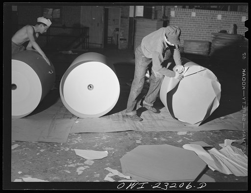 Lufkin, Texas. Southland paper mill. Wrapping rolls of newsprint