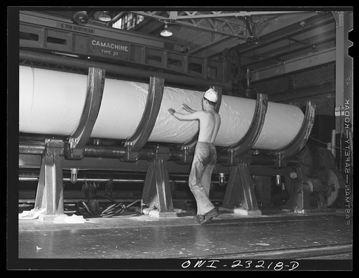 Lufkin, Texas. Southland paper mill. An eighteen foot long roll of newsprint which will be cut to size as ordered by the customer