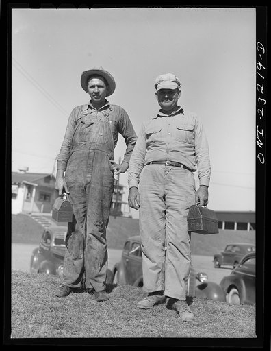 Untitled photo, possibly related to: Lufkin, Texas. Southland paper mill. Paper workers leaving the plant