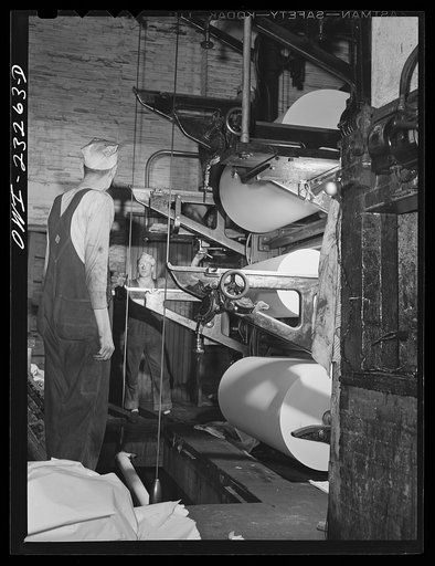 Dallas, Texas. Rolls of newsprint at the back end of the press at the Dallas Morning News