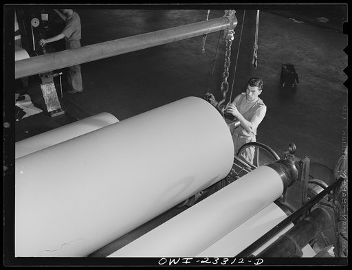 Lufkin, Texas. Southland paper mill. Roll of newsprint coming off the dry end of a paper machine