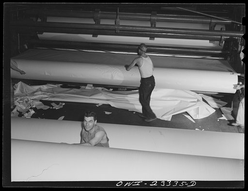 Untitled photo, possibly related to: Lufkin, Texas. Southland paper mill. Rolls of newsprint ready to be rewound and cut to size