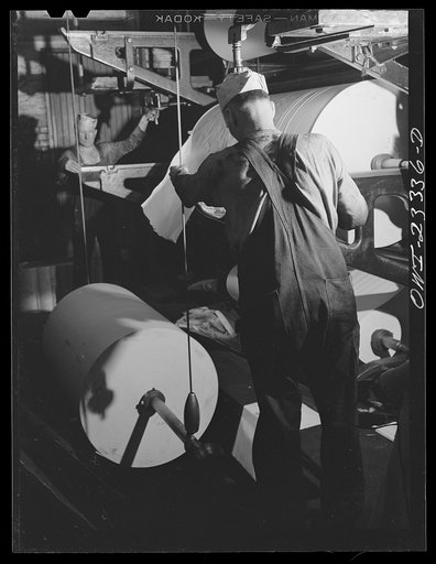 Untitled photo, possibly related to: Lufkin, Texas. Southland paper mill. Rolls of newsprint ready to be rewound and cut to size