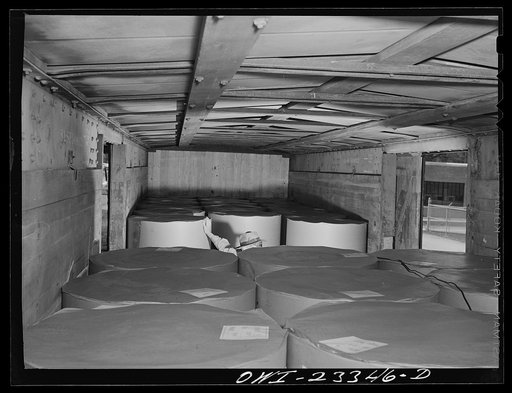 Lufkin, Texas. Southland paper mill. Freight car loaded with rolls of newsprint