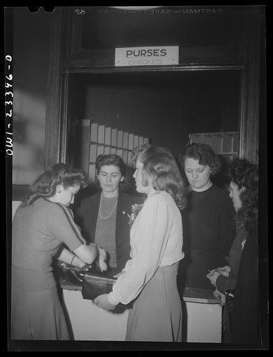 Buffalo, New York. Checking purses at the swingshift dance which is held weekly from midnight to four a.m. at the Main-Utica ballroom