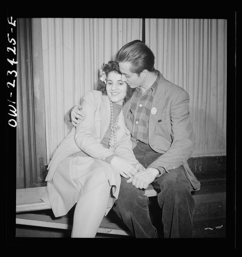Buffalo, New York. Swingshift workers on the sidelines at the weekly swingshift dance held at the Main-Utica ballroom