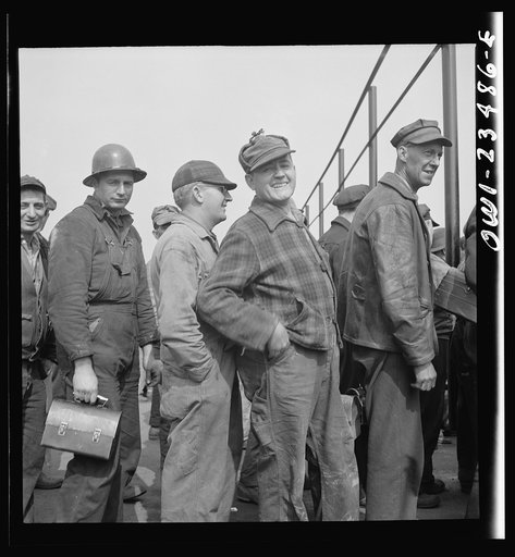 Bethlehem-Fairfield shipyards, Baltimore, Maryland. Lining up before a time clock