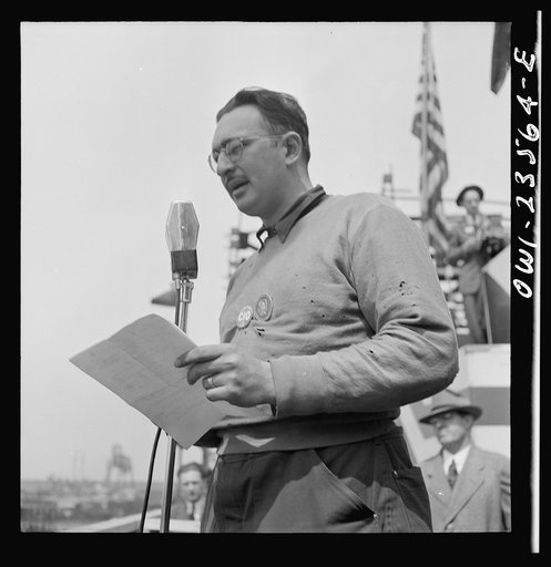 Bethlehem-Fairfield shipyards, Baltimore, Maryland. Union leader making an address at a launching ceremony