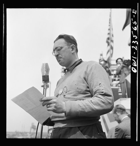 Bethlehem-Fairfield shipyards, Baltimore, Maryland. Union leader making an address at a launching ceremony
