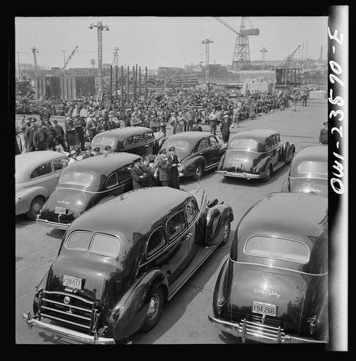 Bethlehem-Fairfield shipyards, Baltimore, Maryland. Automobiles used to transport a launching party