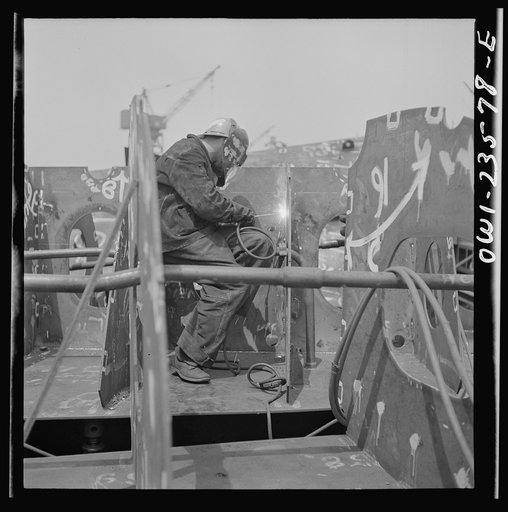 Bethlehem-Fairfield shipyards, Baltimore, Maryland. Welding the floor to a vertical keel