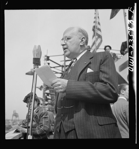 Bethlehem-Fairfield shipyards, Baltimore, Maryland. Guest speaker, a representative of the Maritime Commission, at a launching ceremony