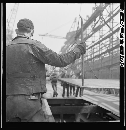 Bethlehem-Fairfield shipyards, Baltimore, Maryland. Erecting bottom shell plates