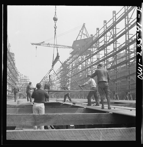 Bethlehem-Fairfield shipyards, Baltimore, Maryland. Erecting bottom shell plates
