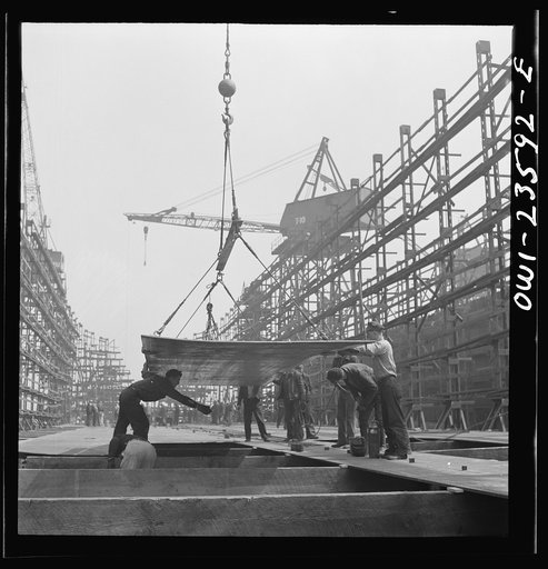 Bethlehem-Fairfield shipyards, Baltimore, Maryland. Erecting bottom shell plates